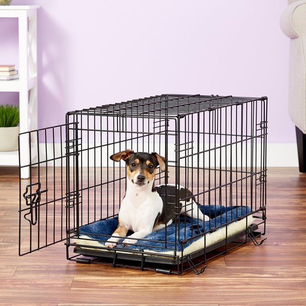 Show full view: MidWest Quiet Time Fleece Reversible Dog Crate Mat, Blue Paw Print, 22-in slide 3 of 7