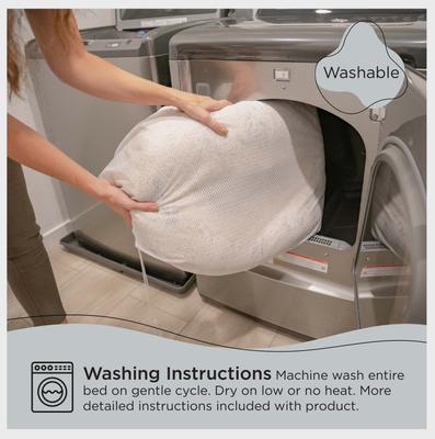 Show full view: Best Friends by Sheri Calming Lux Fur Donut Cuddler Bolster Cat & Dog Bed, Navy, Small slide 6 of 10