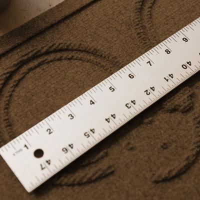 Show full view: Bungalow Flooring WaterHog Puppy Face Dog Placemat, 12x18-in, Dark Brown slide 6 of 8