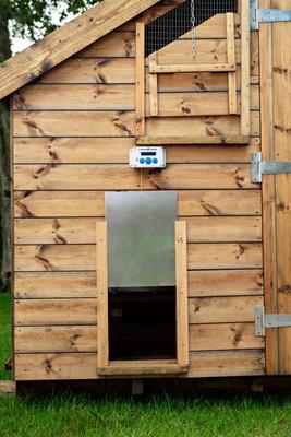 Show full view: ChickenGuard Combi Extreme Automatic Chicken Coop Door Opener & Classic Door Kit slide 2 of 3