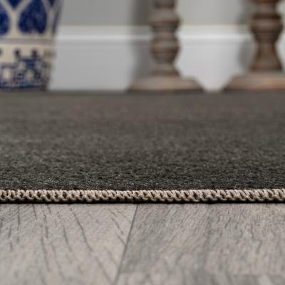 Show full view: JONATHAN Y Twyla Classic Solid Low-Pile Machine-Washable Dog & Cat Area Rug, Dark Gray, 5 x 8-ft slide 7 of 9