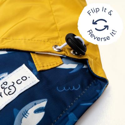 Show full view: Lucy & Co. The Shark Attack Reversible Waterproof Dog Raincoat, Blue/Yellow, Small slide 4 of 8