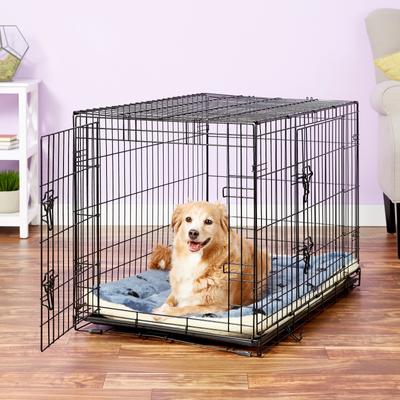 Show full view: MidWest Quiet Time Fleece Reversible Dog Crate Mat, Blue Paw Print, 36-in slide 3 of 8