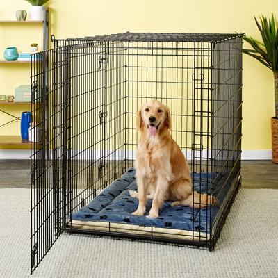 Show full view: MidWest Quiet Time Fleece Reversible Dog Crate Mat, Blue Paw Print, 48-in slide 3 of 8