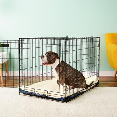 Show full view: MidWest Quiet Time Fleece Reversible Dog Crate Mat, Blue Paw Print, 48-in slide 4 of 8