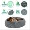 Show in main carousel: FurHaven Calming Cuddler Long Fur Donut Bolster Dog Bed, Gray, Medium slide 4 of 11