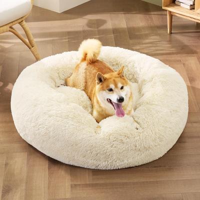 Show full view: Bedsure Calming Fluffy Plush Faux Fur Orthopedic Anti-Slip Donut Dog & Cat Bed, Cream, Medium slide 4 of 8