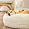 Show in main carousel: Bedsure Calming Fluffy Plush Faux Fur Orthopedic Anti-Slip Donut Dog & Cat Bed, Cream, Medium slide 2 of 8