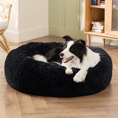 Show full view: Bedsure Calming Fluffy Plush Faux Fur Orthopedic Anti-Slip Donut Dog & Cat Bed, Black, Large slide 5 of 9