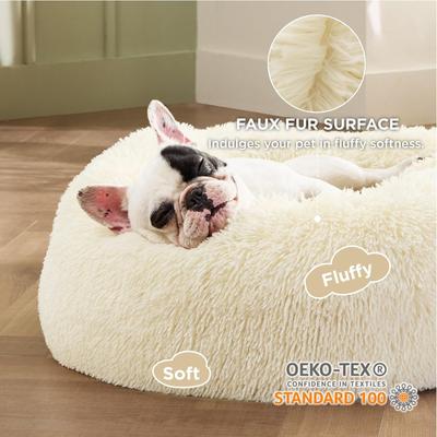 Show full view: Bedsure Calming Fluffy Plush Faux Fur Orthopedic Anti-Slip Donut Dog & Cat Bed, Cream, Small slide 2 of 8