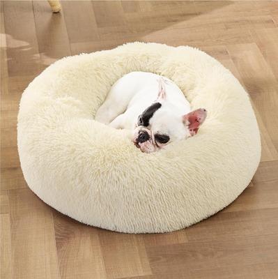 Show full view: Bedsure Calming Fluffy Plush Faux Fur Orthopedic Anti-Slip Donut Dog & Cat Bed, Cream, Small slide 4 of 8