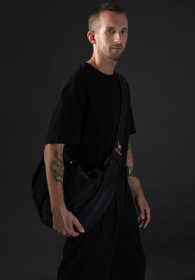 Show full view: Noah & Paw Machine Washable Dog & Cat Sling Carrier, Medium, Black slide 9 of 11