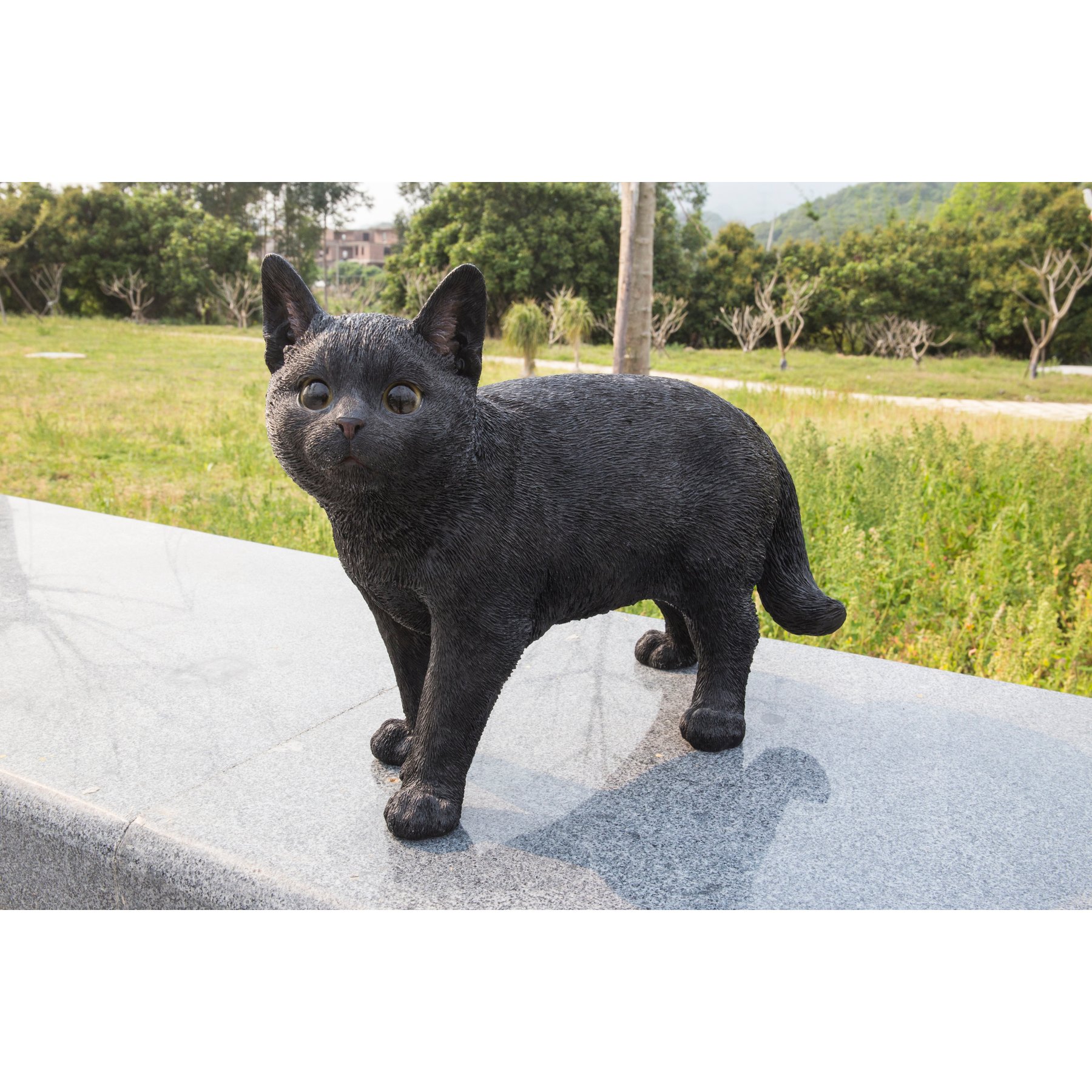 Hi-Line Gift Walking & Looking Left Cat Statue, Black, 11.42-in