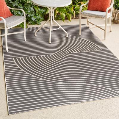 Show full view: JONATHAN Y Arielle Mid-Century Modern Curve Stripe Reversible Machine-Washable Indoor/Outdoor Area Rug, Dark Gray/Cream, 5' x 8' slide 3 of 9