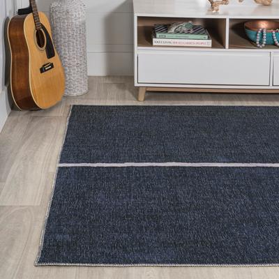 Show full view: JONATHAN Y Linja Solid Centre Stripe Machine-Washable Area Rug, Navy/Gray, 8' x 10' slide 8 of 9