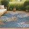 Show in main carousel: JONATHAN Y Calypso Coastal Casual Palm Frond Reversible Machine-Washable Indoor/Outdoor Area Rug, Cream/Navy, 5' x 8' slide 4 of 9