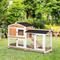 Show in main carousel: PawHut 62-in Wooden Rabbit Hutch with Wheels, Natural Wood slide 2 of 9