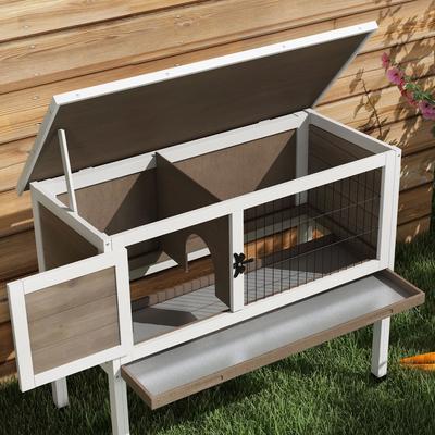Show full view: PawHut Elevated Indoor/Outdoor Rabbit Hutch with Hinged Asphalt Roof, Brown slide 9 of 9