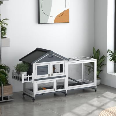 Show full view: PawHut 65-in Wooden Rabbit Hutch with Wheels slide 2 of 10