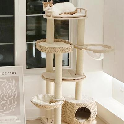Show full view: Happy & Polly Multi-Level 55.5-in Whispering Hollow Natural Wood Cat Tree, Beige slide 2 of 10