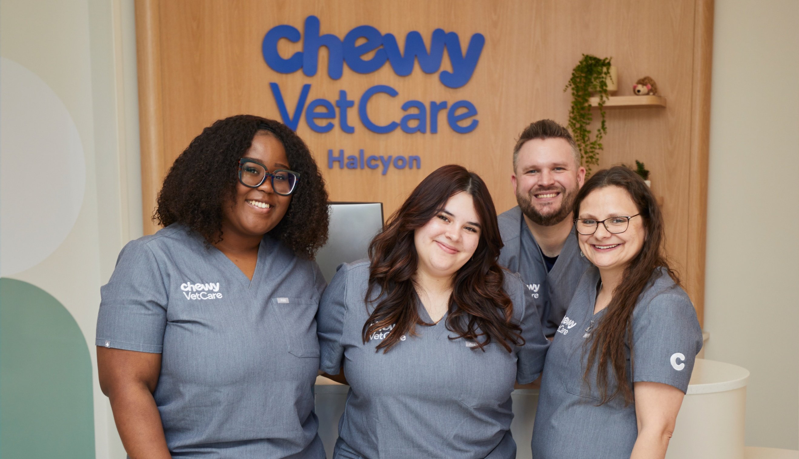 Members of the Chewy Vet Care Halcyon care team gathered in the clinic