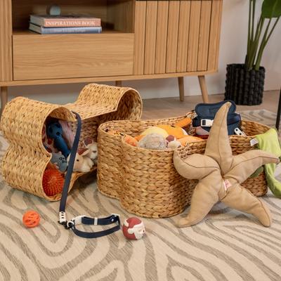 Show full view: THE LICKER STORE Digby Bone-Shaped Large Hand Woven Water Hyacinth Dog Toy Organizer Baskets, Natural, 2 count slide 2 of 8