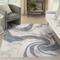 Show in main carousel: Nourison Astra Machine Washable ASW15 Abstract Area Rug, Ivory Blue, 63 x 84-in slide 8 of 10