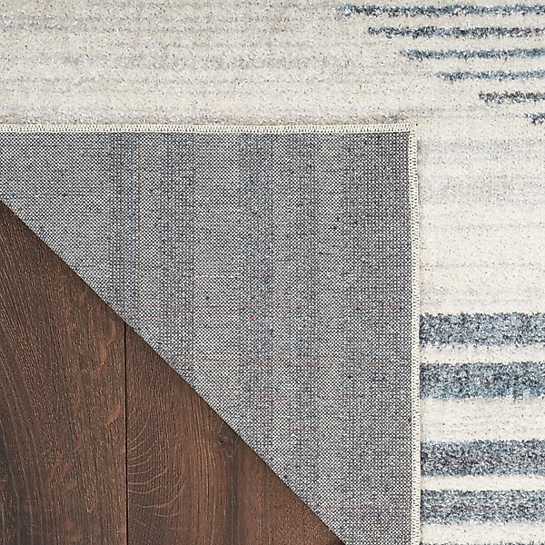 Show full view: Nourison Astra Machine Washable ASW05 Geometric Area Rug, Ivory Blue, 63 x 84-in slide 5 of 9