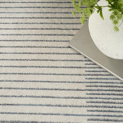 Show full view: Nourison Astra Machine Washable ASW05 Geometric Area Rug, Ivory Blue, 63 x 84-in slide 8 of 9