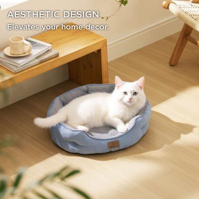 Show full view: Bedsure Round Bolster Anti-Slip Puppy & Kitten Bed with Washable Pillow Cushion, Frost Blue, Small slide 4 of 9