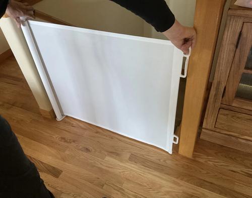 Show full view: NonoPets Safe & Portable Barrier Adjustable Retractable Mesh Dog Gate, White, 71-in width slide 8 of 8