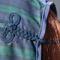 Show in main carousel: Equinavia Ulla Wool Horse Cooler, Navy/Green, 80-in slide 5 of 6