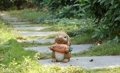 Hi-Line Gift Rabbit Holding Carrot Welcome Sign Statue, 10-in