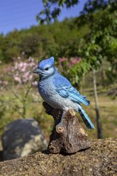 Hi-Line Gift 6.5-in Motion Activated Singing Blue Jay Standing On Stump Outdoor Decor