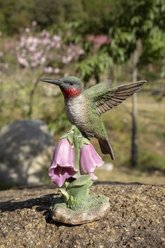 Hi-Line Gift 5.51-in Hummingbird On Foxglove Statue Outdoor Decor