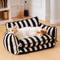 Show in main carousel: FunnyFuzzy Striped Faux Lambswool Orthopedi Dog Sofa Bed, Black, X-Large slide 3 of 6