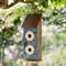 Show in main carousel: Glitzhome 2-Tiered Solid Wood & Metal Daisy Decorative Outdoor Garden Bird House slide 4 of 9