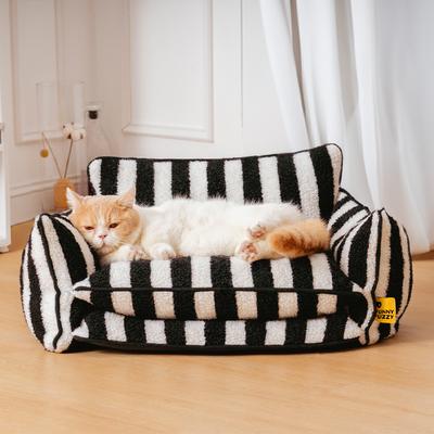 Show full view: FunnyFuzzy Striped Faux Lambswool Orthopedi Dog Sofa Bed, Black, Large slide 4 of 10