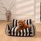 Show in main carousel: FunnyFuzzy Striped Faux Lambswool Orthopedi Dog Sofa Bed, Black, Large slide 3 of 10