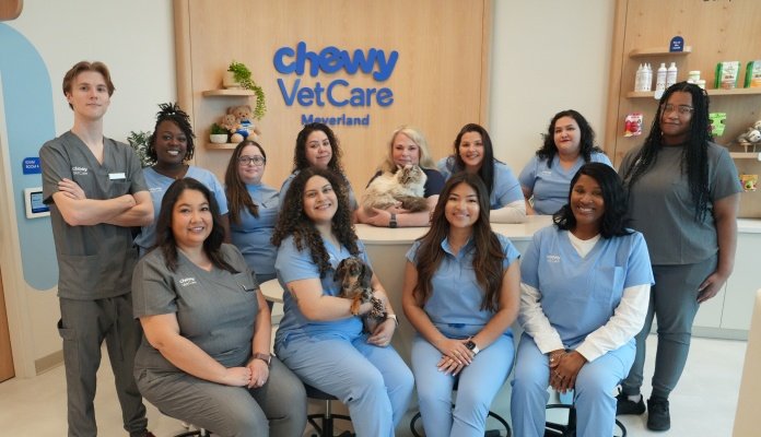 Members of the Chewy Vet Care Meyerland care team gathered in the clinic