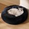 Show in main carousel: Bedsure Calming Fluffy Plush Faux Fur Anti-Slip Donut Machine-Washable Bolster Dog & Cat Bed, Black, X-Small slide 1 of 7