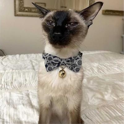 Show full view: Necoichi Kiku Ribbon Bow Tie Cotton Breakaway Cat Collar with Bell, Navy, 8.2 to 13.7-in neck, 2/5-in wide slide 8 of 10