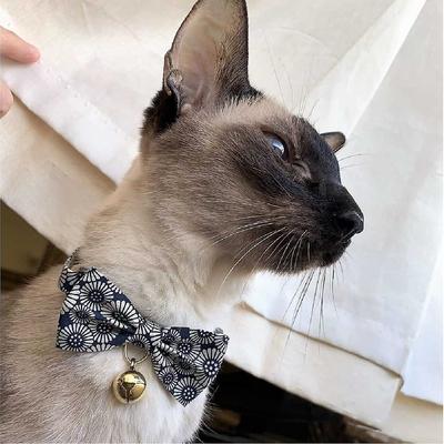 Show full view: Necoichi Kiku Ribbon Bow Tie Cotton Breakaway Cat Collar with Bell, Navy, 8.2 to 13.7-in neck, 2/5-in wide slide 9 of 10