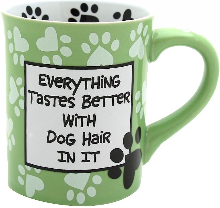 Green coffee mug with the words 'Everything Tastes Better With Dog Hair In It.' on the front.
