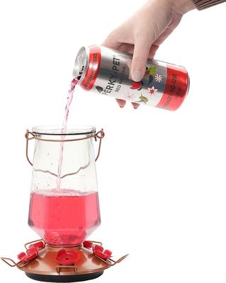 Show full view: Perky-Pet Ready to Use Red Nectar Hummingbird Food, 16-oz can slide 9 of 9