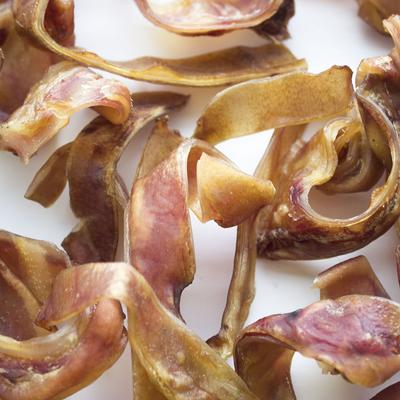 Show full view: SuperCan Bully Sticks Pig Ear Sliver Dog Treats, 1-lb bag slide 4 of 6