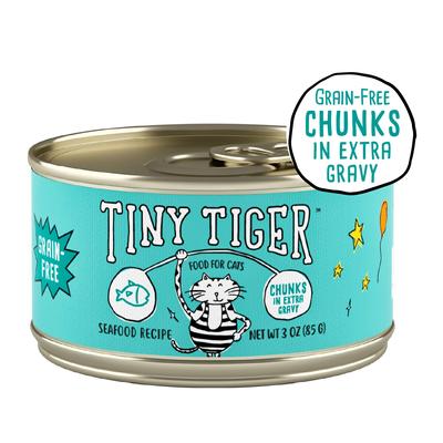 Show full view: Tiny Tiger Chunks in EXTRA Gravy Seafood Recipe Grain-Free Canned Cat Food, 3-oz, case of 24 + Fancy Feast Gravy Lovers Ocean Whitefish & Tuna Feast in Sauteed Seafood Flavor Gravy Canned Cat Food, 3-oz, case of 24 slide 2 of 9