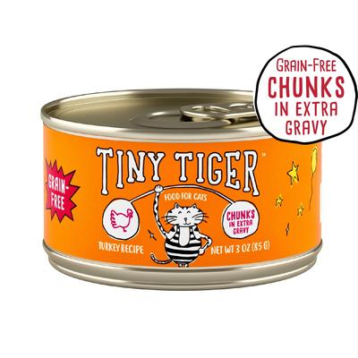 Show full view: Tiny Tiger Chunks in EXTRA Gravy Turkey Recipe Grain-Free Canned Cat Food, 3-oz, case of 24 + Fancy Feast Gravy Lovers Turkey Feast in Roasted Turkey Flavor Gravy Canned Cat Food, 3-oz, case of 24 slide 2 of 9