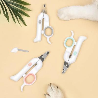 Show full view: One for Pets with Led & Wood's Lamp Dog Nail Clippers, Pink slide 4 of 7